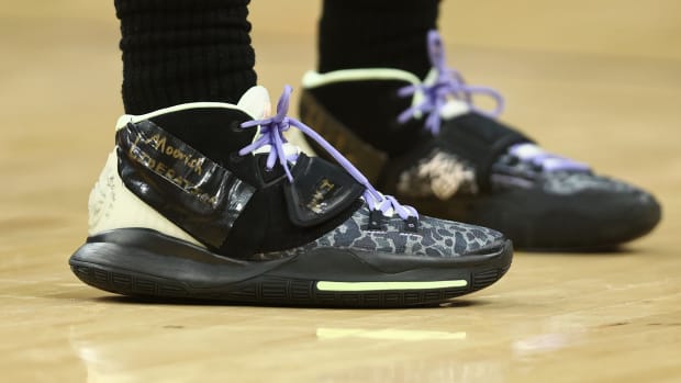 View of black Nike Kyrie shoes.